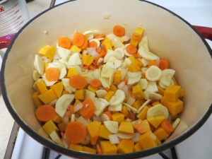 cooking up the carrots, parsnips, and squash!
